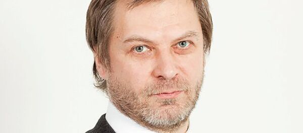 Аналитик группы компаний Финам Леонид Делицын - Sputnik Узбекистан