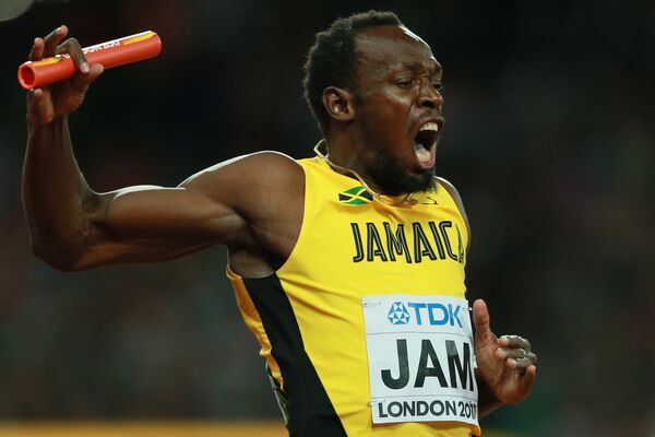 Усэйн Болт (Ямайка) в финальном забеге эстафеты 4х100 метров среди мужчин на чемпионате мира - 2017 по легкой атлетике в Лондоне - Sputnik Узбекистан