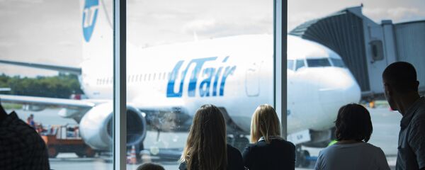 Самолет авиакомпании UTair - Sputnik Узбекистан