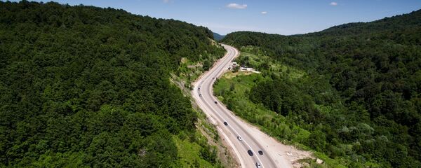 Участок автомобильной дороги, архивное фото Участок автомобильной дороги, архивное фото - Sputnik Узбекистан
