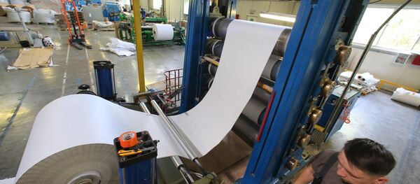 Производство термочувствительной бумаги для изготовления чековой ленты в Калининграде Производство термочувствительной бумаги для изготовления чековой ленты в Калининграде - Sputnik Ўзбекистон