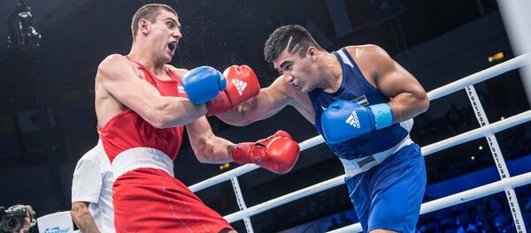 Узбекский боксер Санжар Турсунов на чемпионате мира по боксу Узбекский боксер Санжар Турсунов на чемпионате мира по боксу - Sputnik Ўзбекистон