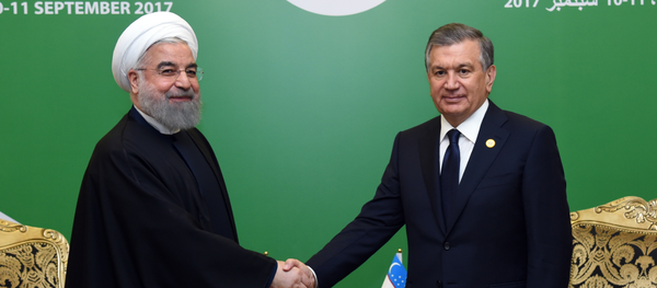 Шавкат Мирзиёев и Хасан Рухан - Sputnik Узбекистан