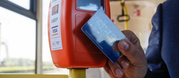 Оплата проезда электронными картами, архивное фото Оплата проезда электронными картами, архивное фото - Sputnik Узбекистан