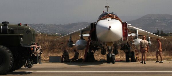 Российская боевая авиация на аэродроме Хмеймим в Сирии Российская боевая авиация на аэродроме Хмеймим в Сирии - Sputnik Узбекистан