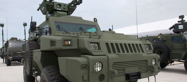 Бронированная машина Арлан на IV Международной выставке вооружения и военно-технического имущества KADEX в Астане Бронированная машина Арлан на IV Международной выставке вооружения и военно-технического имущества KADEX в Астане - Sputnik Узбекистан