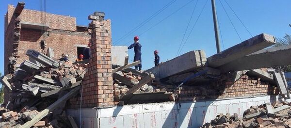 Перекрытие и стена обрушились в строящемся доме в Астане Перекрытие и стена обрушились в строящемся доме в Астане - Sputnik Узбекистан