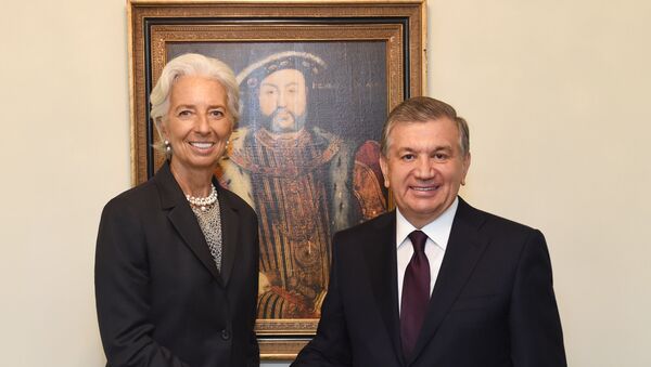 Президент Узбекистана Шавкат Мирзиёев и Кристин Лагард - Sputnik Узбекистан