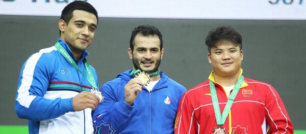 Ўзбекистонлик Фарҳод Собиров ёпиқ иншоотларда ва жанг санъатлари бўйича V Осиё ўйинларида оғир атлетика бўйича кумуш медални қўлга киритди Ўзбекистонлик Фарҳод Собиров ёпиқ иншоотларда ва жанг санъатлари бўйича V Осиё ўйинларида оғир атлетика бўйича кумуш медални қўлга киритди - Sputnik Ўзбекистон