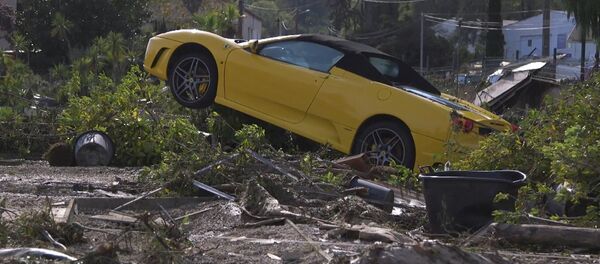 Сломанные деревья и груды машин: последствия наводнения на юге Франции - Sputnik Узбекистан