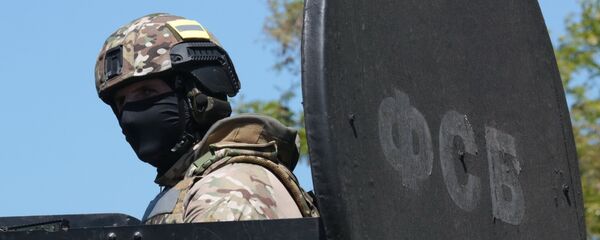 Сотрудник подразделения спецназначения ФСБ России - Sputnik Узбекистан