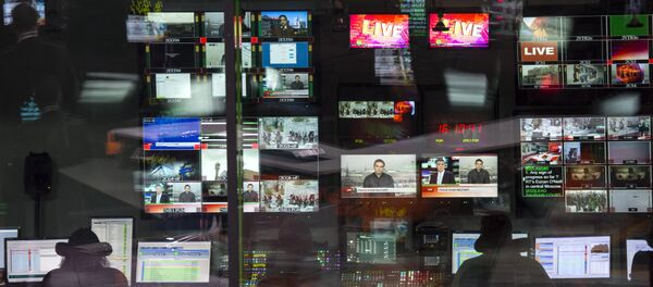 Аппаратная ньюсрума телеканала Russia Today Аппаратная ньюсрума телеканала Russia Today - Sputnik Узбекистан