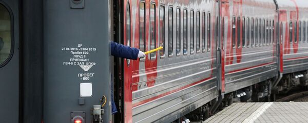 Поезд ОАО РЖД, архивное фото Поезд ОАО РЖД, архивное фото - Sputnik Узбекистан