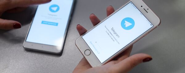 Мессенджер Telegram на экране телефона Мессенджер Telegram на экране телефона - Sputnik Ўзбекистон