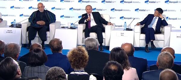 Владимир Путин о RT, Sputnik и о женщине-президенте Владимир Путин о RT, Sputnik и о женщине-президенте - Sputnik Узбекистан