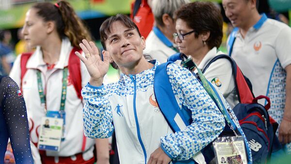 Оксана Чусовитина (Узбекистан) во время квалификационных соревнований по спортивной гимнастике на XXXI летних Олимпийских играх - Sputnik Ўзбекистон
