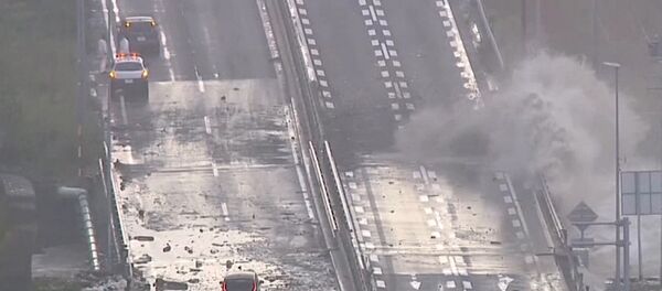 Мощный тайфун Лан обрушился на Японию Мощный тайфун Лан обрушился на Японию - Sputnik Узбекистан