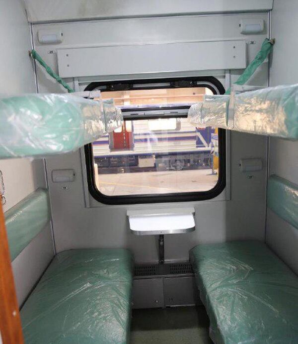 Вагон пассажирского подвижного состава под фирменным знаком Мade in Uzbekistan Вагон пассажирского подвижного состава под фирменным знаком Мade in Uzbekistan - Sputnik Узбекистан