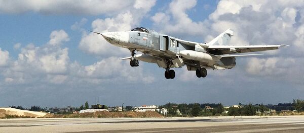 Российская боевая авиация на аэродроме Хмеймим в Сирии Российская боевая авиация на аэродроме Хмеймим в Сирии - Sputnik Узбекистан