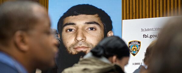 A photo of Sayfullo Saipov is displayed at a news conference at One Police Plaza Wednesday, Nov. 1, 2017, in New York. Saipov is accused of driving a truck on a bike path that killed several and injured others Tuesday near One World Trade Center. A photo of Sayfullo Saipov is displayed at a news conference at One Police Plaza Wednesday, Nov. 1, 2017, in New York. Saipov is accused of driving a truck on a bike path that killed several and injured others Tuesday near One World Trade Center. - Sputnik Ўзбекистон