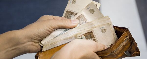 Кошелек с деньгами - Sputnik Ўзбекистон