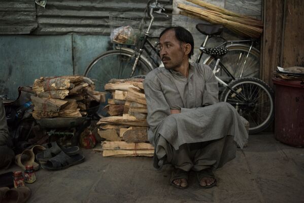 Продавец дров в Хазарейской общине в Кабуле - Sputnik Узбекистан