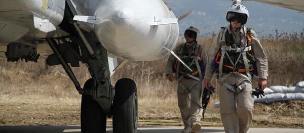 Российская боевая авиагруппа на аэродроме Хмеймим в Сирии Российская боевая авиагруппа на аэродроме Хмеймим в Сирии - Sputnik Узбекистан