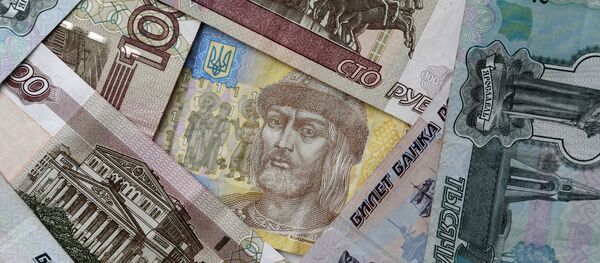Денежные купюры и монеты России и Украины - Sputnik Узбекистан