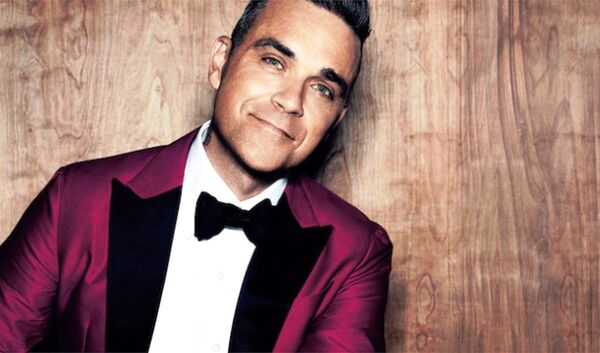 Британский поп певец Робби Уильямс Британский поп певец Робби Уильямс - Sputnik Ўзбекистон