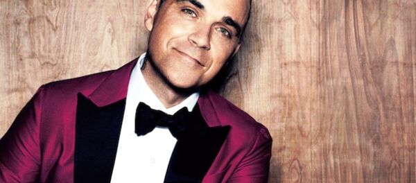 Британский поп-певец Робби Уильямс - Sputnik Узбекистан