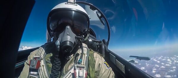 Пилот ВКС РФ во время боевого вылета в Сирии Пилот ВКС РФ во время боевого вылета в Сирии - Sputnik Узбекистан