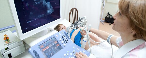 Ультразвуковое исследование беременной женщины Ультразвуковое исследование беременной женщины - Sputnik Узбекистан