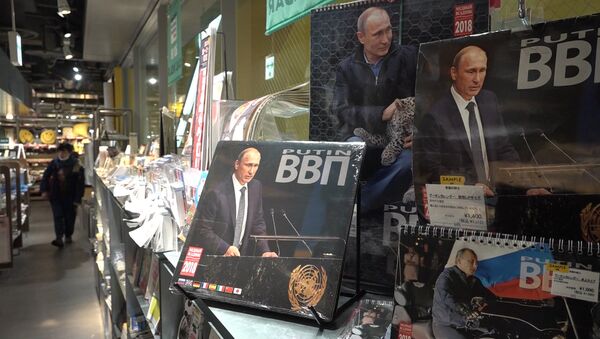 В Токио раскупают календари на 2018 год с изображением Путина - Sputnik Узбекистан