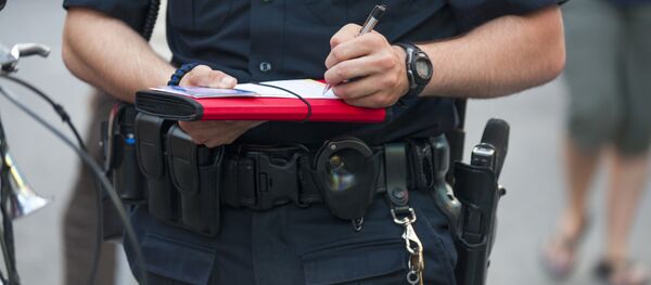 Сотрудник американской полиции Сотрудник американской полиции - Sputnik Узбекистан