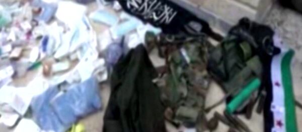 Сирийские военные захватили оружие и форму террористов в Тель-Скеке - Sputnik Узбекистан