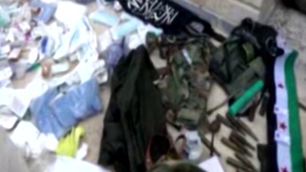 Сирийские военные захватили оружие и форму террористов в Тель-Скеке - Sputnik Узбекистан