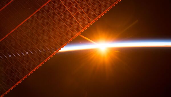 Вид на восход солнца с борта МКС - Sputnik Ўзбекистон