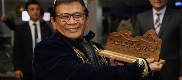 Свыше 60 туристов из Сингапура и Малайзии сегодня приземлились в аэропорту Ташкента - Sputnik Узбекистан