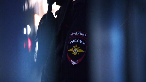 Nashivka na rukave sotrudnika politsii v Rossii, arxivnoe foto - Sputnik O‘zbekiston