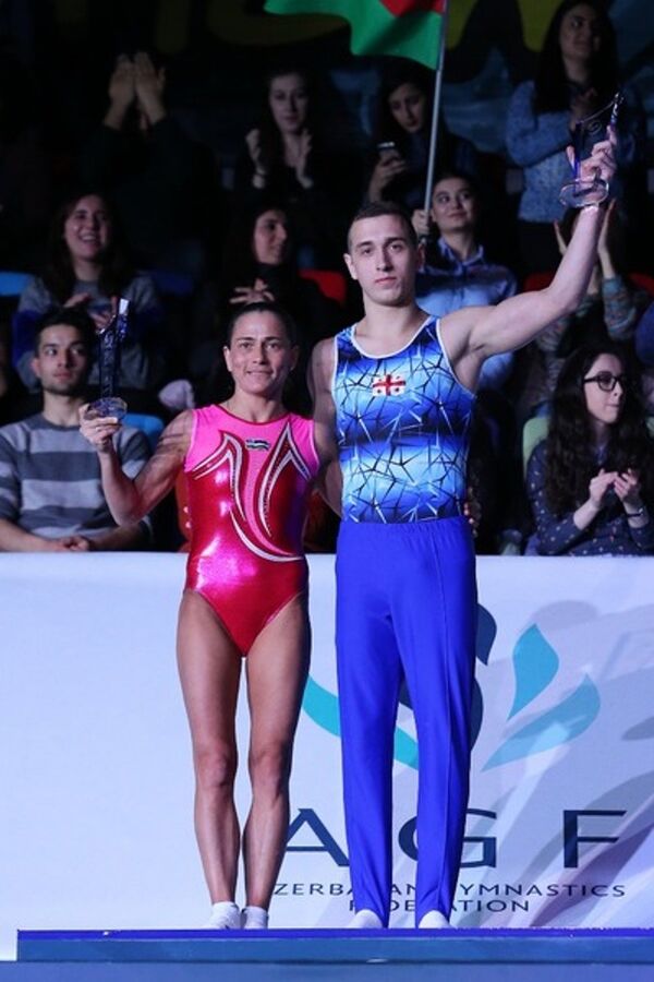 Оксана Чусовитина и Константин Кузовков на Кубке мира по спортивной гимнастике серии FIG в Баку - Sputnik Узбекистан