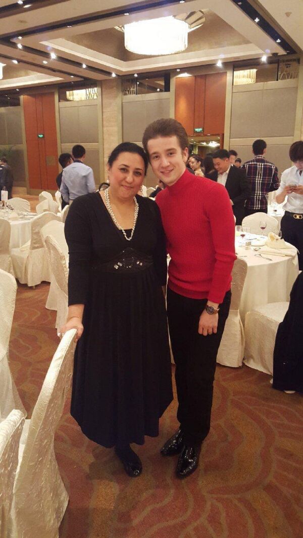 Саодат Нуманова с фигуристом Мишей Ге - Sputnik Узбекистан