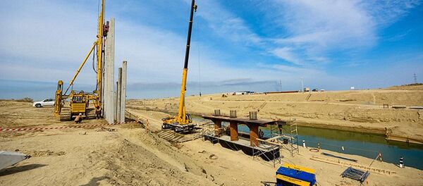 Фоторепортаж с места строительства Кандымского ГПК Фоторепортаж с места строительства Кандымского ГПК - Sputnik Узбекистан