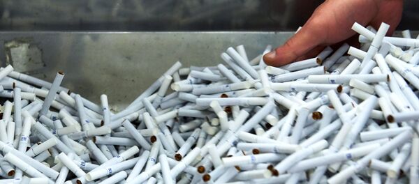 Производство сигарет на фабрике - Sputnik Узбекистан