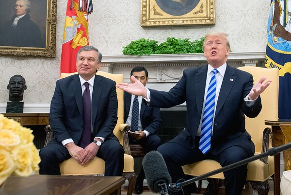 Shavkat Mirziyoyev va Donald Tramp. - Sputnik O‘zbekiston