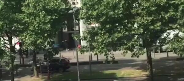 Кадры ликвидации стрелка в Бельгии - Sputnik Узбекистан