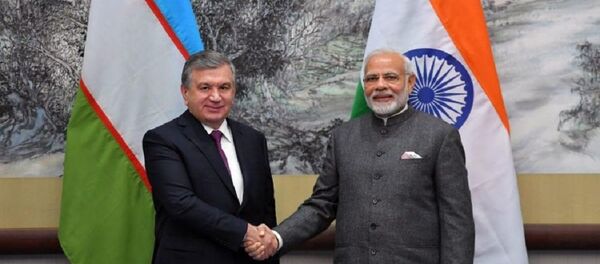 Шавкат Мирзиёев встретился с Нарендрой Моди Шавкат Мирзиёев встретился с Нарендрой Моди - Sputnik Ўзбекистон