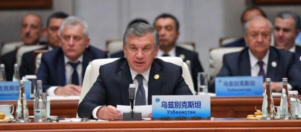 Шавкат Мирзиёев на саммите ШОС в Циндао - Sputnik Узбекистан