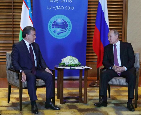 Президент РФ В. Путин на саммите ШОС в Китае - Sputnik Узбекистан