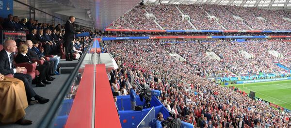 Президент РФ В. Путин и гости церемонии открытия ЧМ по футболу на стадионе Лужники - Sputnik Узбекистан
