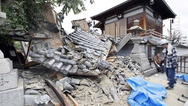 Разрушенные в результате землетрясения дома в Японии  - Sputnik Узбекистан